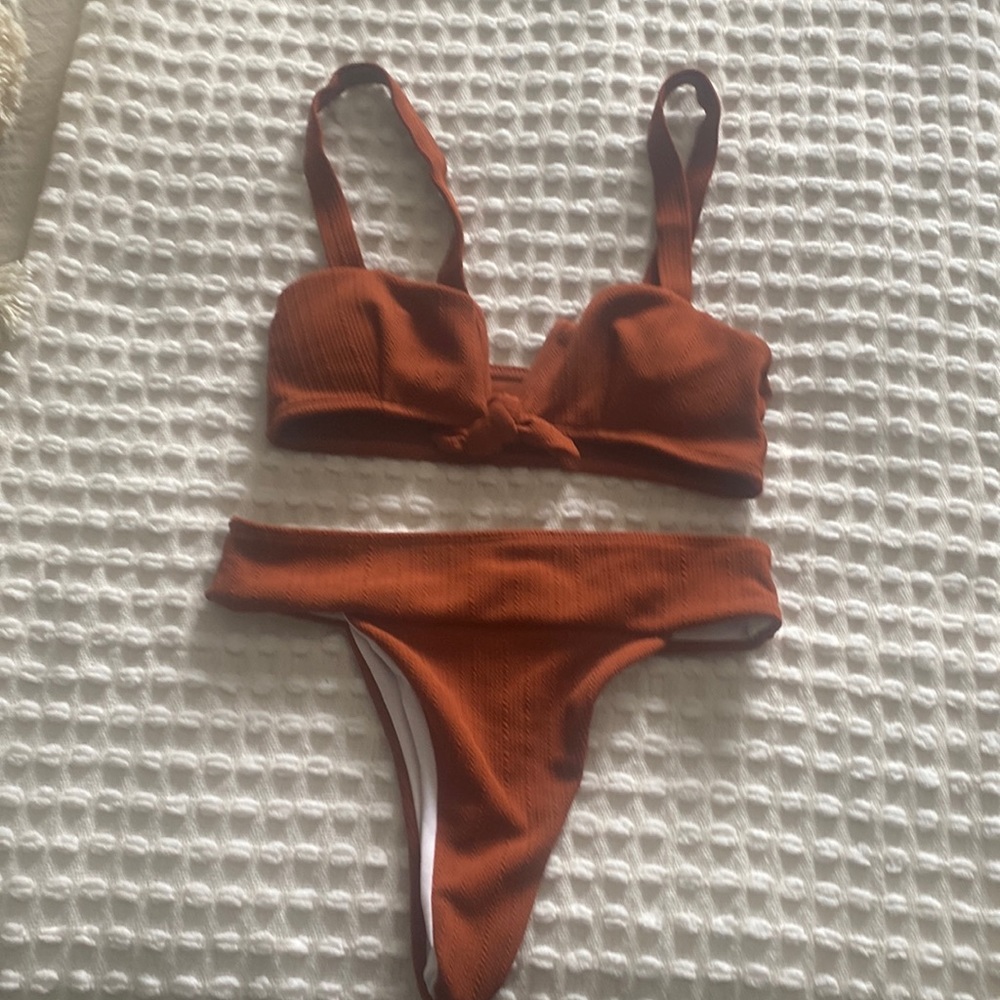 Burnt orange bikini with a beautiful cut and shape.